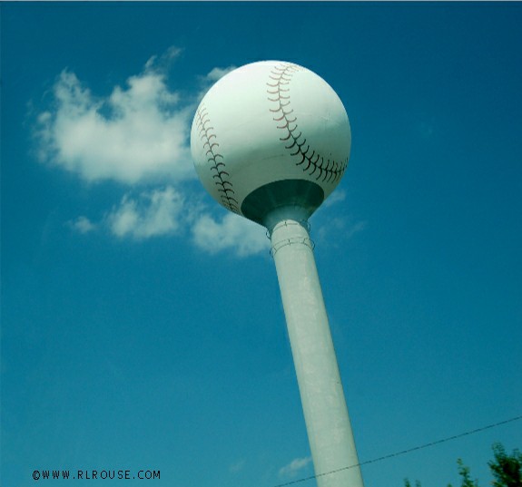 Water tower painted to look like a baseball.
