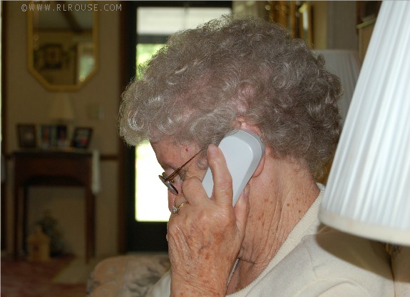 Mom talking on the phone.