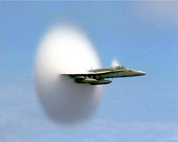 An F/A-18 Hornet breaking the sound barrier.