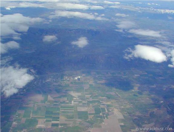 View of the ground from aboard an airplane.