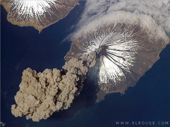 An erupting volcano as seen from space.