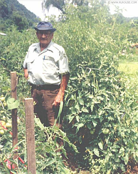 My dad standing in his garden.