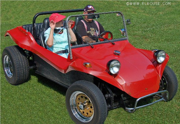 Mom riding my brother's dune buggy on the 4th of July.