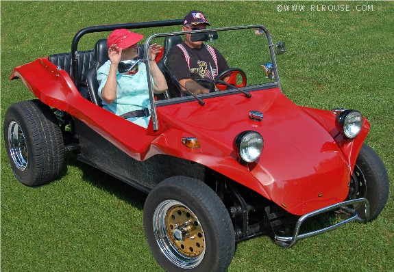 Mom riding my brother's dune buggy on the 4th of July.