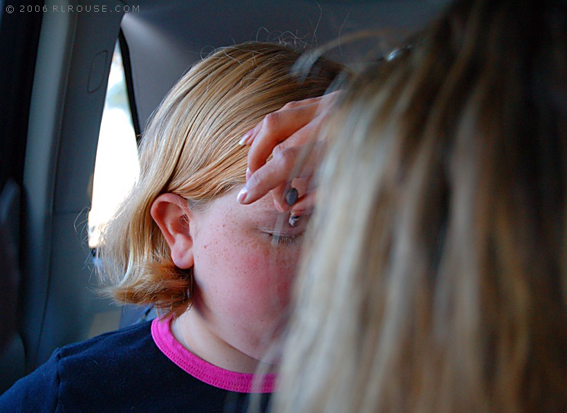 Photo of Olivia getting "made up".