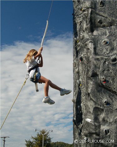 Climbing a rock wall.